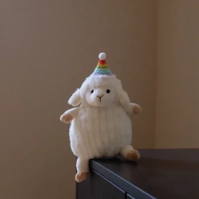 Mini Aries Doll, Comfort Doll Wearing a colorful hat (19cm)