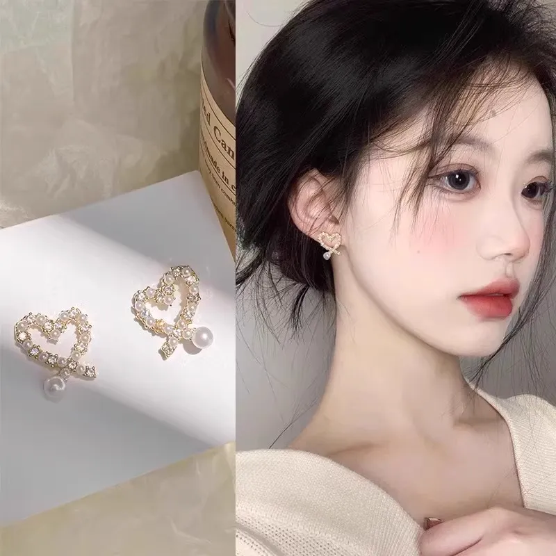 Elegant pearl heart-shaped clip-on earrings for those without pierced ears