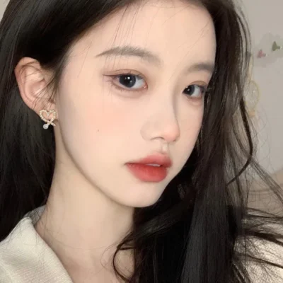 Elegant pearl heart-shaped clip-on earrings for those without pierced ears